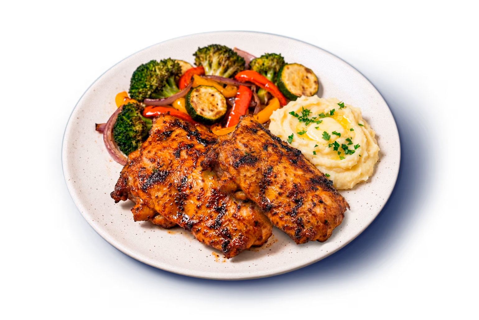 Plato de churrasco crocante con verduras y puré