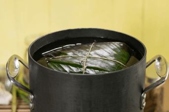 Cocinar tamales en olla